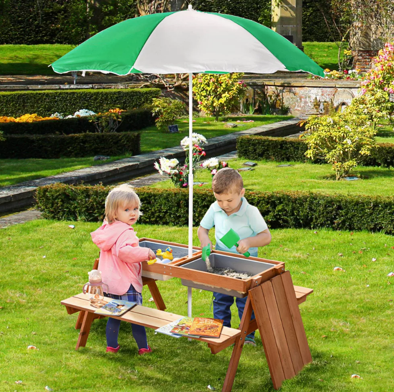 Sand and water table with umbrella