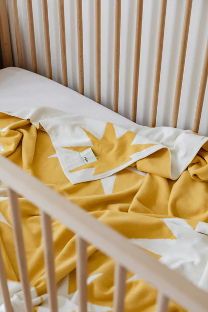 Knitted organic baby blanket