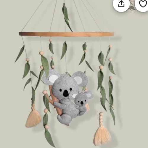 Mobile with wind up music box