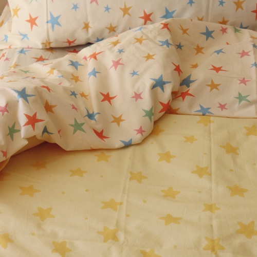 Yellow star doona cover
